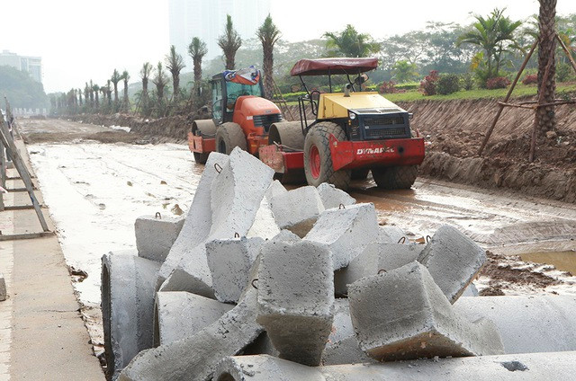 Tiếp tục xén dải phân cách, mở rộng đường gom Đại lộ Thăng Long - 8