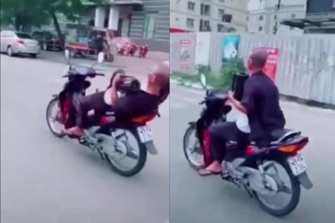 'Quái xế' 62 tuổi buông 2 tay phóng xe vèo vèo ở Hà Nội bị phạt 8,25 triệu đồng - 1