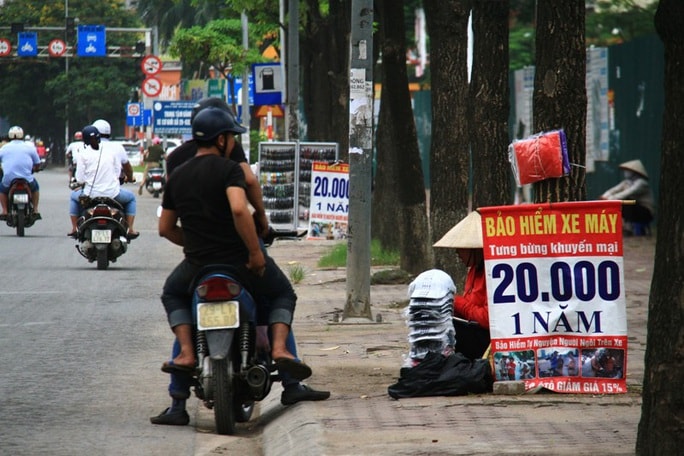 Bảo hiểm xe máy giá rẻ bán tràn lan, doanh nghiệp sẽ bị xử phạt - Ảnh 1.