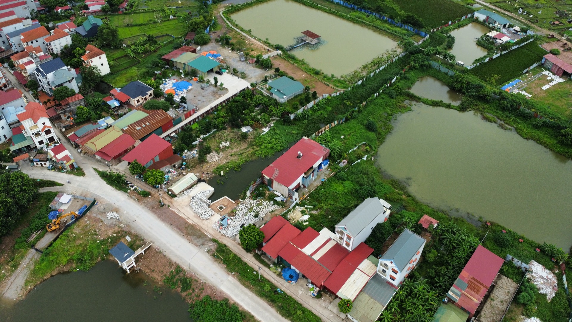 Hà Nội nghiêm cấm hành vi lợi dụng thời điểm sắp xếp để lấn chiếm đất đai, xây dựng trái phép - Ảnh 2.
