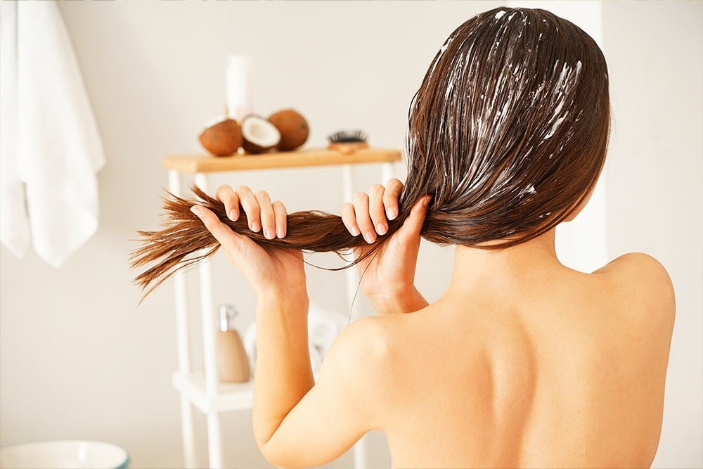 4 cách sử dụng dầu dừa để kích thích mọc tóc- Ảnh 2.