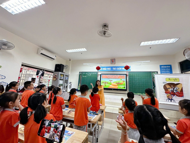 Phụ huynh kỳ vọng gì vào bộ sách giáo khoa thống nhất từ năm 2026?- Ảnh 1. Phụ huynh kỳ vọng gì vào bộ sách giáo khoa thống nhất từ năm 2026?- Ảnh 1.