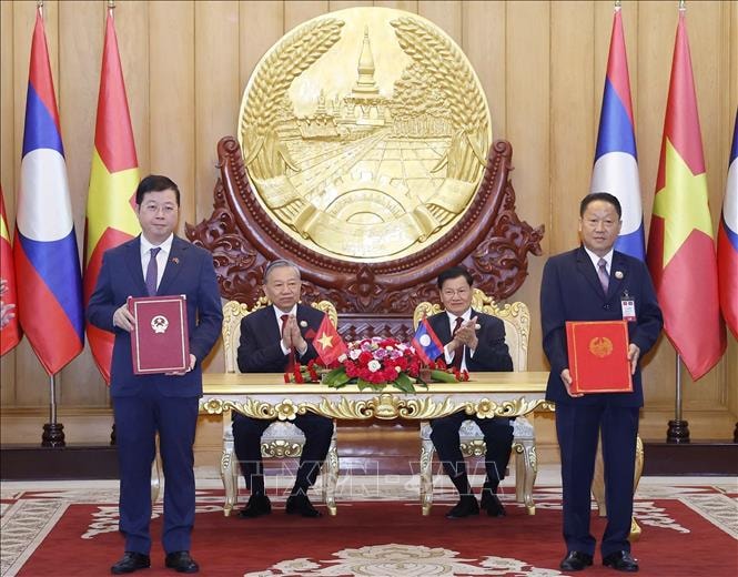 Tổng Bí thư Tô Lâm và Tổng Bí thư, Chủ tịch nước Lào chứng kiến Lễ trao các văn kiện hợp tác- Ảnh 4.