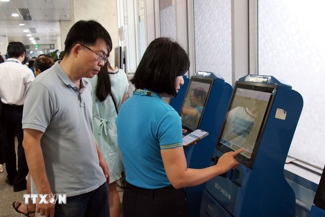 Từ 1/12, chỉ làm thủ tục tại quầy với khách có hành lý ký gửi và khách đặc biệt- Ảnh 1. Từ 1/12, chỉ làm thủ tục tại quầy với khách có hành lý ký gửi và khách đặc biệt- Ảnh 1.