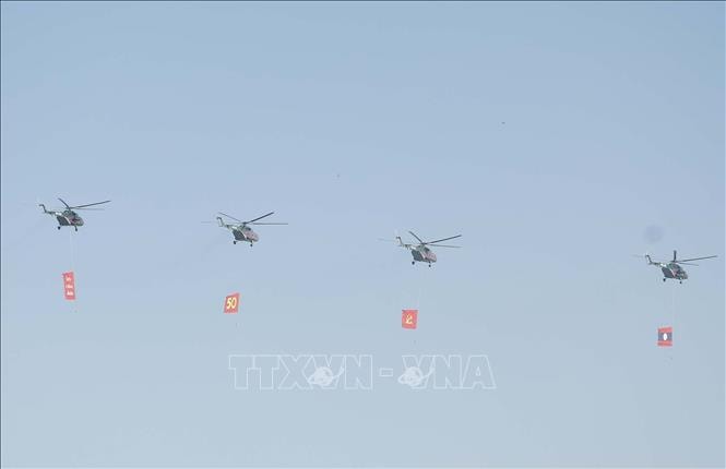 Kỷ niệm trọng thể 50 năm Quốc khánh nước Cộng hòa Dân chủ Nhân dân Lào- Ảnh 6.