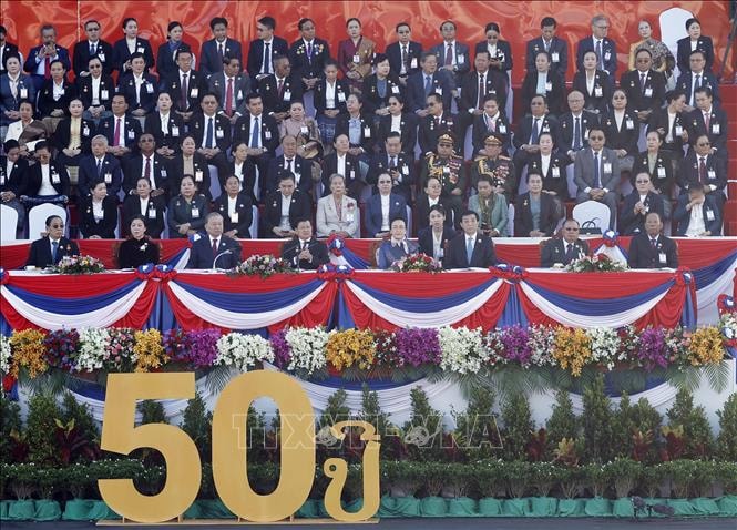 Kỷ niệm trọng thể 50 năm Quốc khánh nước Cộng hòa Dân chủ Nhân dân Lào- Ảnh 1.