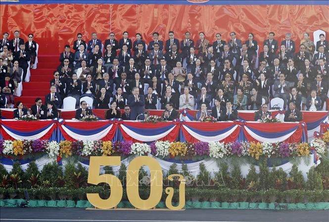 Tổng Bí thư Tô Lâm và Phu nhân dự Lễ kỷ niệm 50 năm Quốc khánh Lào- Ảnh 2.