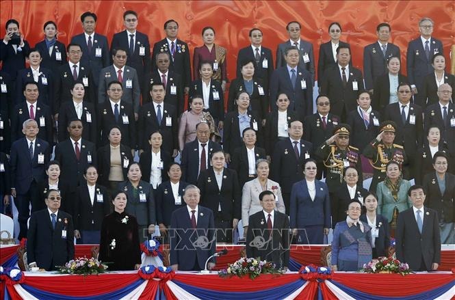 Tổng Bí thư Tô Lâm và Phu nhân dự Lễ kỷ niệm 50 năm Quốc khánh Lào- Ảnh 1.