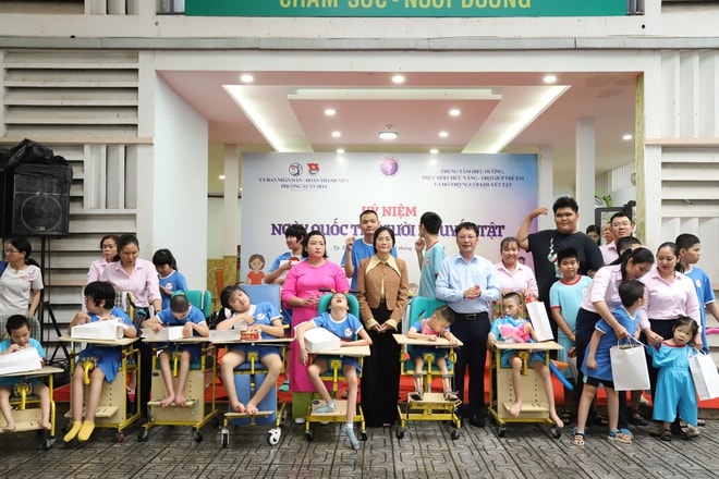 TPHCM kỷ niệm Ngày Quốc tế Người khuyết tật: Lan tỏa thông điệp 'không ai bị bỏ lại phía sau'- Ảnh 4. TPHCM kỷ niệm Ngày Quốc tế Người khuyết tật: Lan tỏa thông điệp 'không ai bị bỏ lại phía sau'- Ảnh 4.