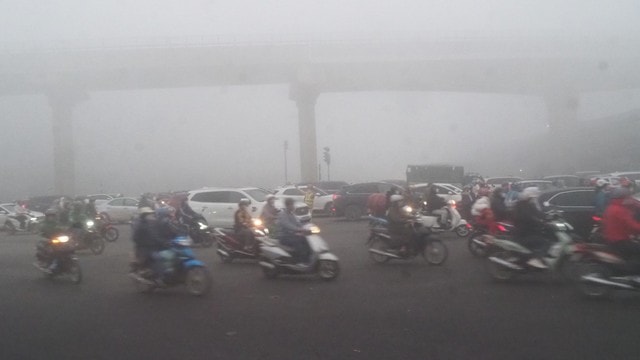 Hà Nội cao điểm ô nhiễm không khí, hàng loạt điểm cảnh báo màu tím- Ảnh 1. Hà Nội cao điểm ô nhiễm không khí, hàng loạt điểm cảnh báo màu tím- Ảnh 1.