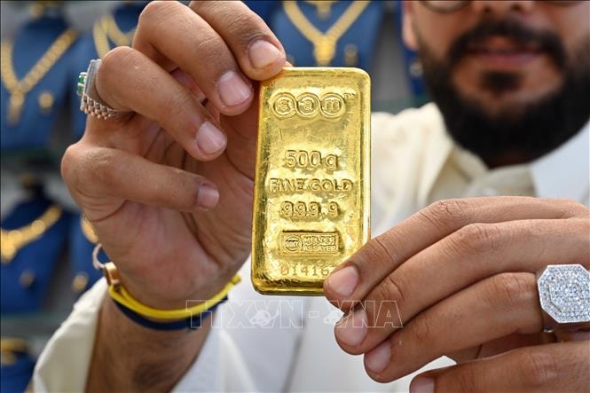 Vàng và bạc chịu áp lực bán mạnh khi các quỹ tái cân bằng hoạt động- Ảnh 1.