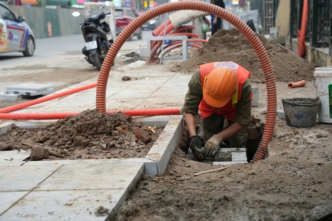 Nhà siêu mỏng xuất hiện sau khi mở rộng đường Nguyễn Tuân- Ảnh 9.