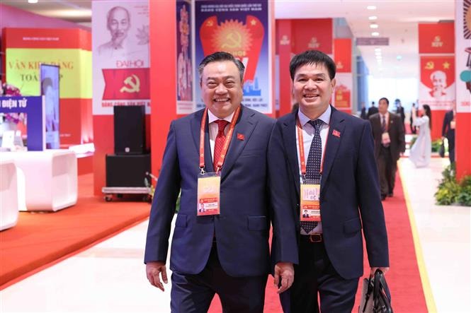 Đại biểu đến dự khai mạc Đại hội XIV của Đảng- Ảnh 4.