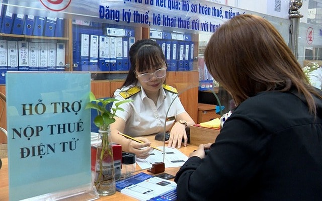 Từ 14/2, không xử phạt chậm nộp hồ sơ khai thuế khi phải nộp lại do thay đổi kỳ tính thuế- Ảnh 1.