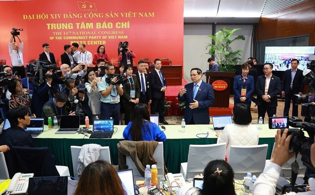 Thủ tướng Phạm Minh Chính động viên lực lượng báo chí tác nghiệp tại Đại hội XIV- Ảnh 1.