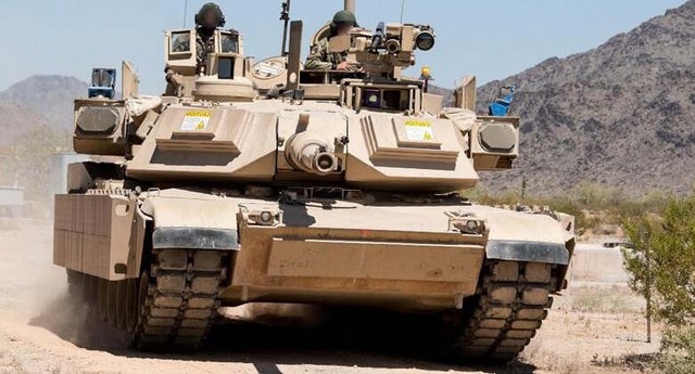 Mỹ triển khai xe tăng Abrams sát biên giới Ukraine- Ảnh 1. Mỹ triển khai xe tăng Abrams sát biên giới Ukraine- Ảnh 1.