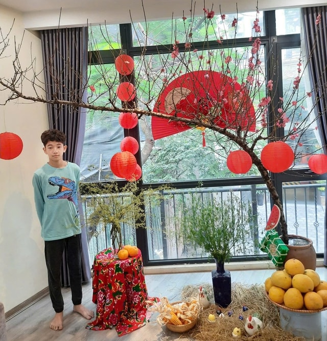 Gói bánh chưng, mua đào từ sớm: Phong cách đón xuân mới của một bộ phận người trẻ- Ảnh 4.