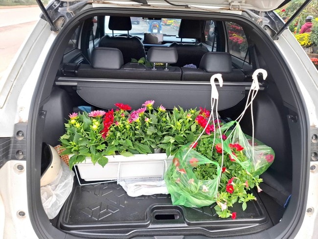 Phố phường rộn ràng không khí mua sắm Tết- Ảnh 9.