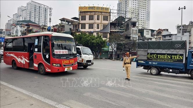 Cảnh sát giao thông sẽ dẫn đường, hỗ trợ các đoàn chở nhân dân về quê ăn Tết- Ảnh 1.
