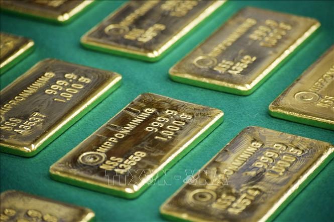 Vàng tái lập mốc 5.000 USD sau phán quyết thuế quan từ Mỹ- Ảnh 1. Vàng tái lập mốc 5.000 USD sau phán quyết thuế quan từ Mỹ- Ảnh 1.