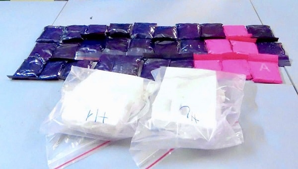 Bắt nóng đối tượng vận chuyển 2 bánh heroin, 6.000 viên ma túy tổng hợp trong đêm- Ảnh 2.