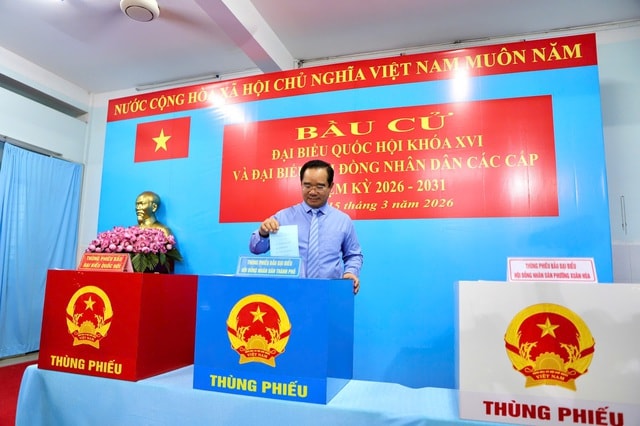 31 xã, phường trên địa bàn TPHCM đạt 100% cử tri đi bỏ phiếu bầu cử- Ảnh 2.
