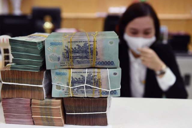 Thị trường tiền tệ Việt Nam tháng 2 biến động mạnh- Ảnh 1.