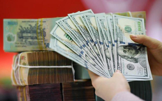 Tỷ giá USD 24/3 tiếp tục leo thang- Ảnh 1.