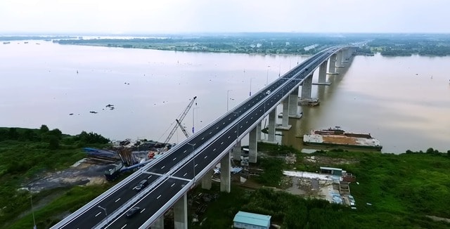 Bộ Xây dựng bàn giao cho TPHCM quản lý cầu Nhơn Trạch- Ảnh 1.