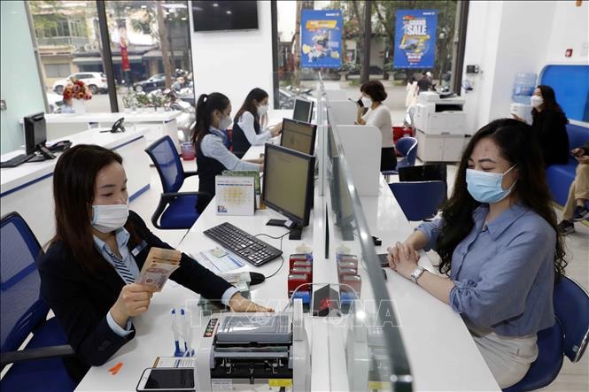 Lãi suất ngân hàng tiếp tục nhích tăng- Ảnh 1.