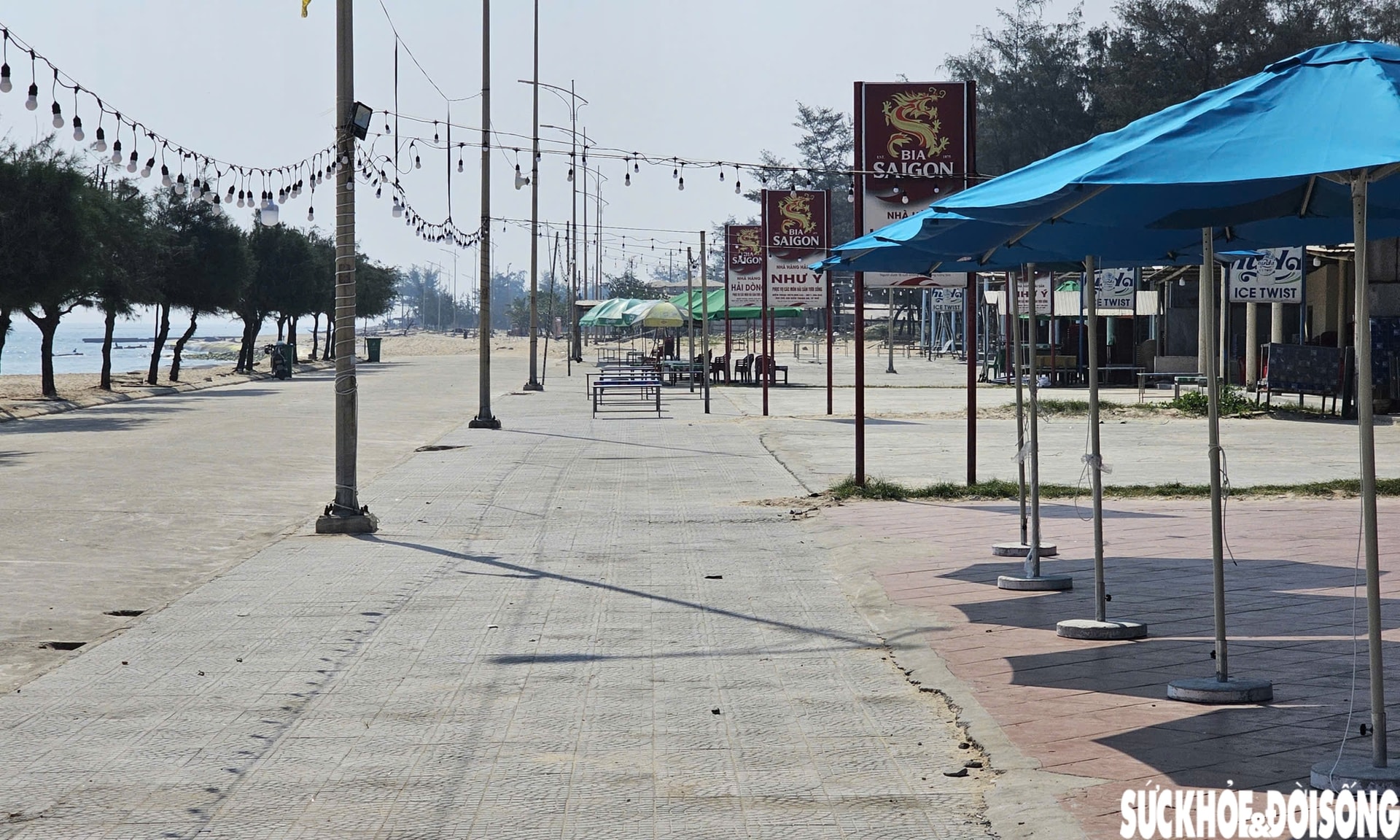 Oằn mình vượt qua nhiều đợt mưa bão, bãi biển nổi tiếng ở Huế vào mùa đón khách- Ảnh 12.