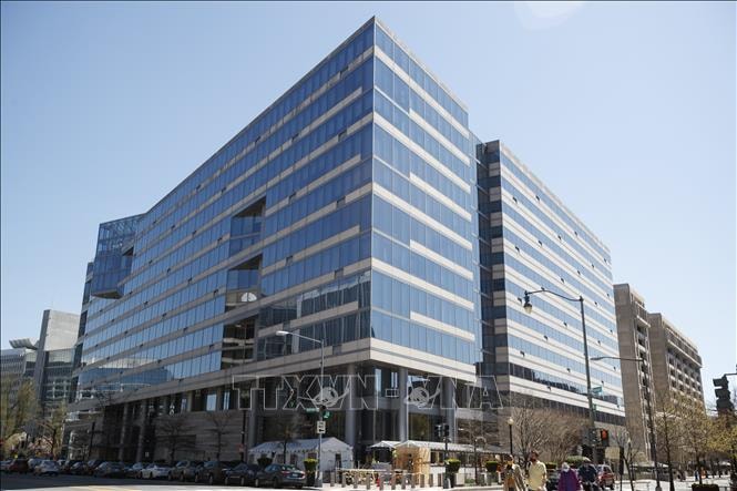 IMF hạ dự báo tăng trưởng toàn cầu năm 2026- Ảnh 1.