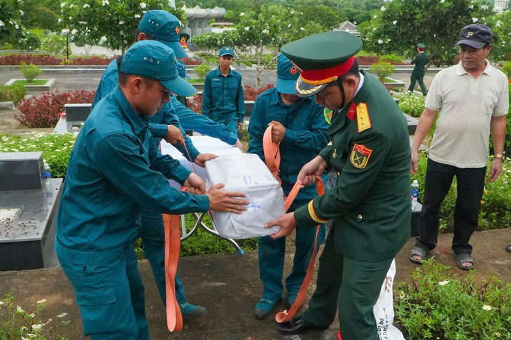 Đà Nẵng: Đưa 3 cha con liệt sĩ về an nghỉ tại nghĩa trang sau hơn nửa thế kỷ- Ảnh 1.