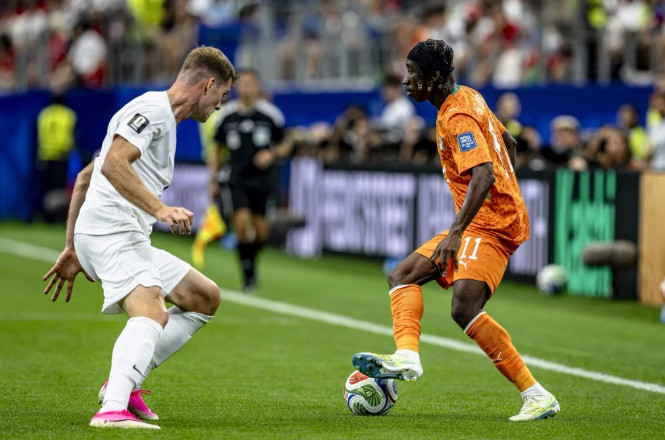 Diomande thi đấu cho đội tuyển Bờ Biển Ngà tại World Cup. Ảnh: Getty Images.