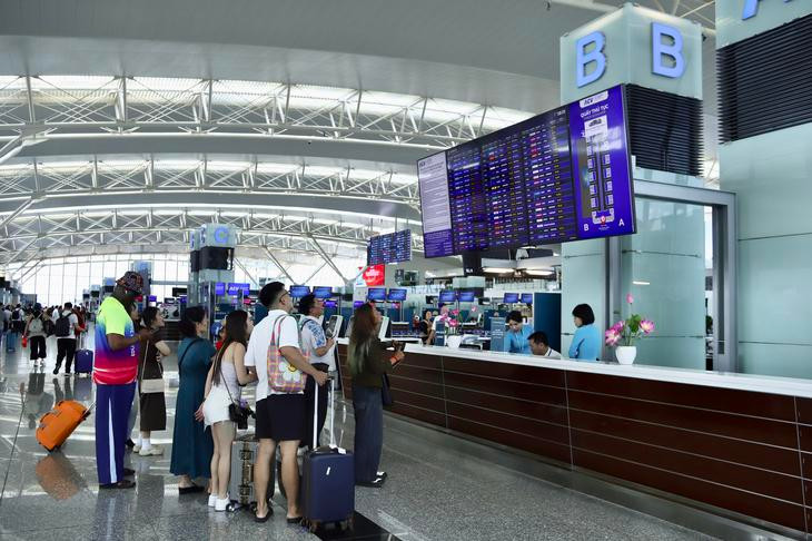 Sân bay Nội Bài thay đổi cách đón, trả khách từ 3/8: Hành khách, tài xế cần đặc biệt lưu ý - Ảnh 1.