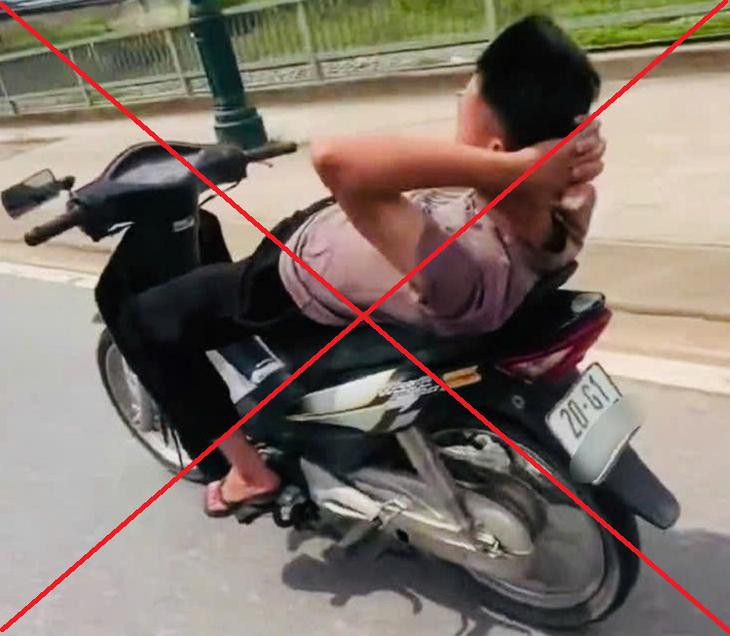Công an Thái Nguyên triệu tập nam thanh niên thả hai tay, nằm trên yên lái xe- Ảnh 1.