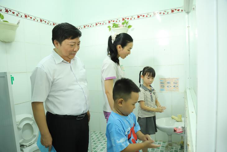 TPHCM cảnh báo dịch chồng dịch vào mùa mưa - Ảnh 2.