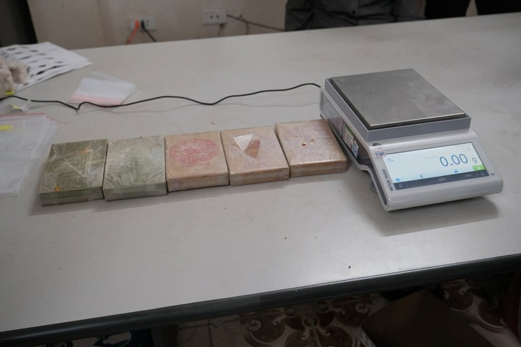 Bắt Đàm Văn Hưng 'ôm' 5 bánh heroin nặng gần 1,7kg ở Cao Bằng- Ảnh 2.