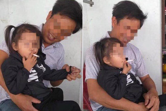 Dân mạng phẫn nộ trước thái độ lạ của ông bố khi để con nhỏ hút thuốc lá