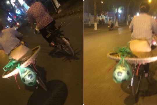 Bức ảnh người mẹ cùng quả bóng mua cho con được cột sau xe đạp gây xúc động