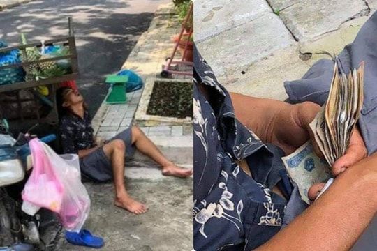 Xót xa hình ảnh người đàn ông ngủ gục bên lề đường, tay vẫn cầm xấp tiền lẻ