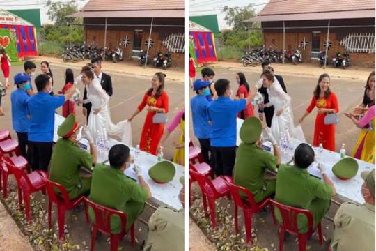 Hình ảnh cô dâu chú rể cùng toàn bộ khách đo thân nhiệt trước khi vào hôn trường gây chú ý MXH