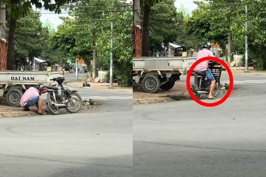 Người đàn ông dừng xe, lấy cắp nắp cống thoát nước gây bức xúc