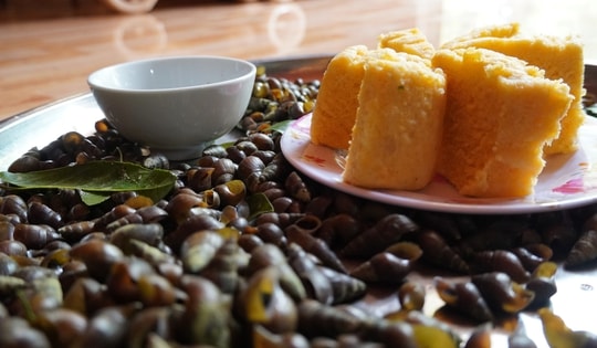 Đặc sản Quảng Bình: Rằm tháng ba về Minh Hóa ăn cơm bồi, ốc đực