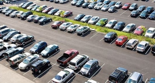 Điều kiện đối với đất làm bãi giữ xe được miễn, giảm tiền sử dụng đất, tiền thuê đất mới nhất?