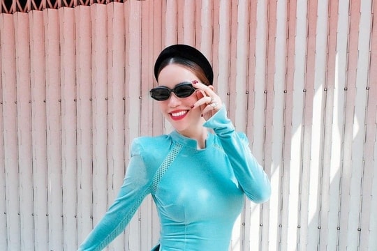 Hồ Ngọc Hà diện áo dài xách túi nửa tỷ du xuân