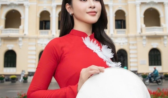 Hoa hậu Lý Kim Thảo thướt tha trong tà áo dài đỏ thêu bồ câu trắng