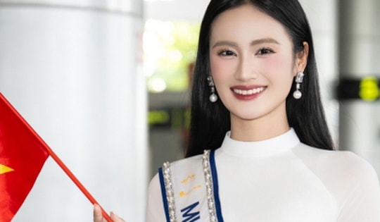 Hoa hậu Ý Nhi rạng rỡ trong tà áo dài trắng khi trở về từ Miss World