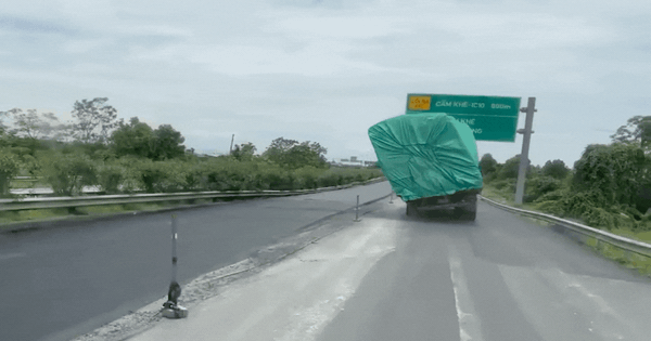 Xe tải 'siêu vẹo' chạy băng băng trên cao tốc, suýt va biển báo: Tài xế nói gì?