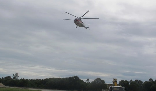 Bộ Quốc phòng điều trực thăng cứu trợ người dân vùng lũ Nghệ An